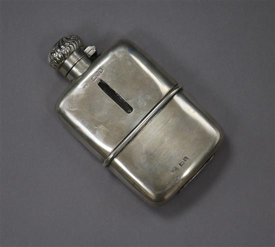A late Victorian silver mounted glass hip flask, Chester, 1899, 11.8cm.